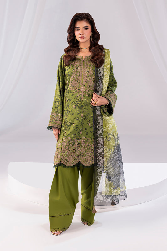 Woman wearing a green traditional outfit with a white background